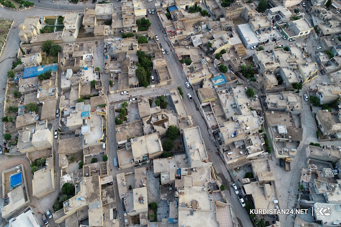 گوزەرێک بە کۆڵانه‌كانی یەکێک لەگەڕەکە دێرینەکانی دەربەندیخان 