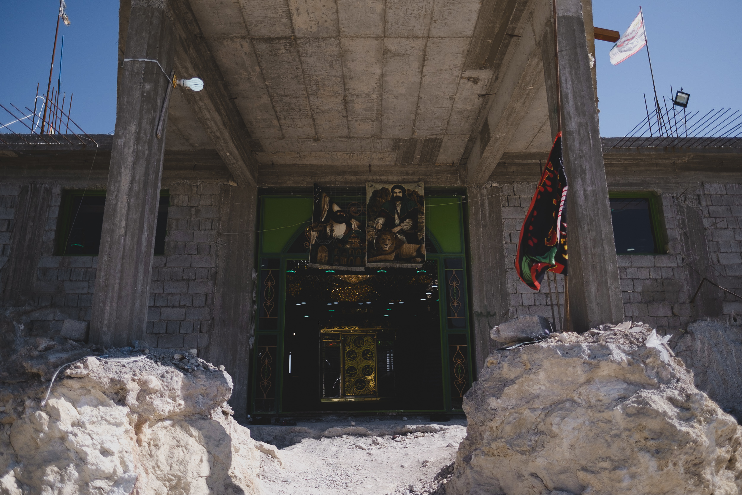 The entrance to the rebuilt shrine of Saida Zeyneb, the first holy place belonging to any religion to be rebuilt in Shingal. (Photo: Kurdistan 24/Levi Clancy)