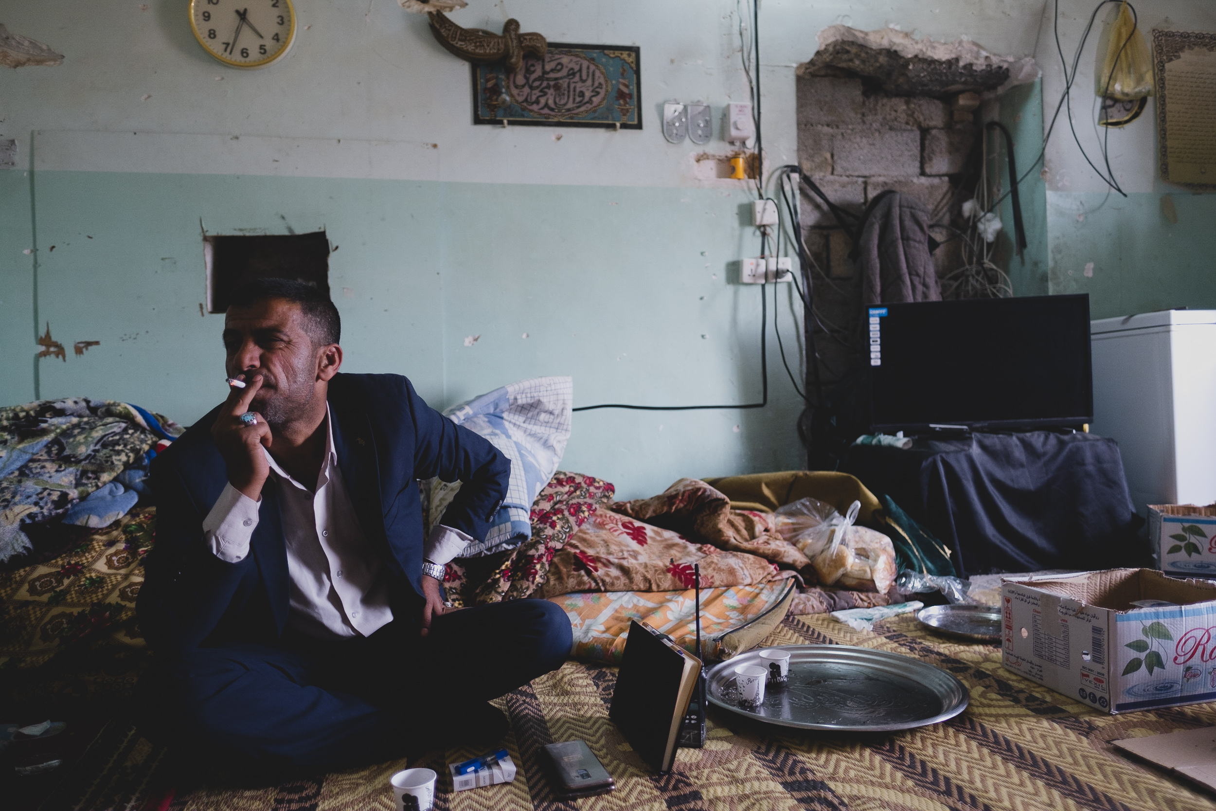 Sayid Ammar at the guest room of the shrine. (Photo: Kurdistan 24/Levi Clancy)