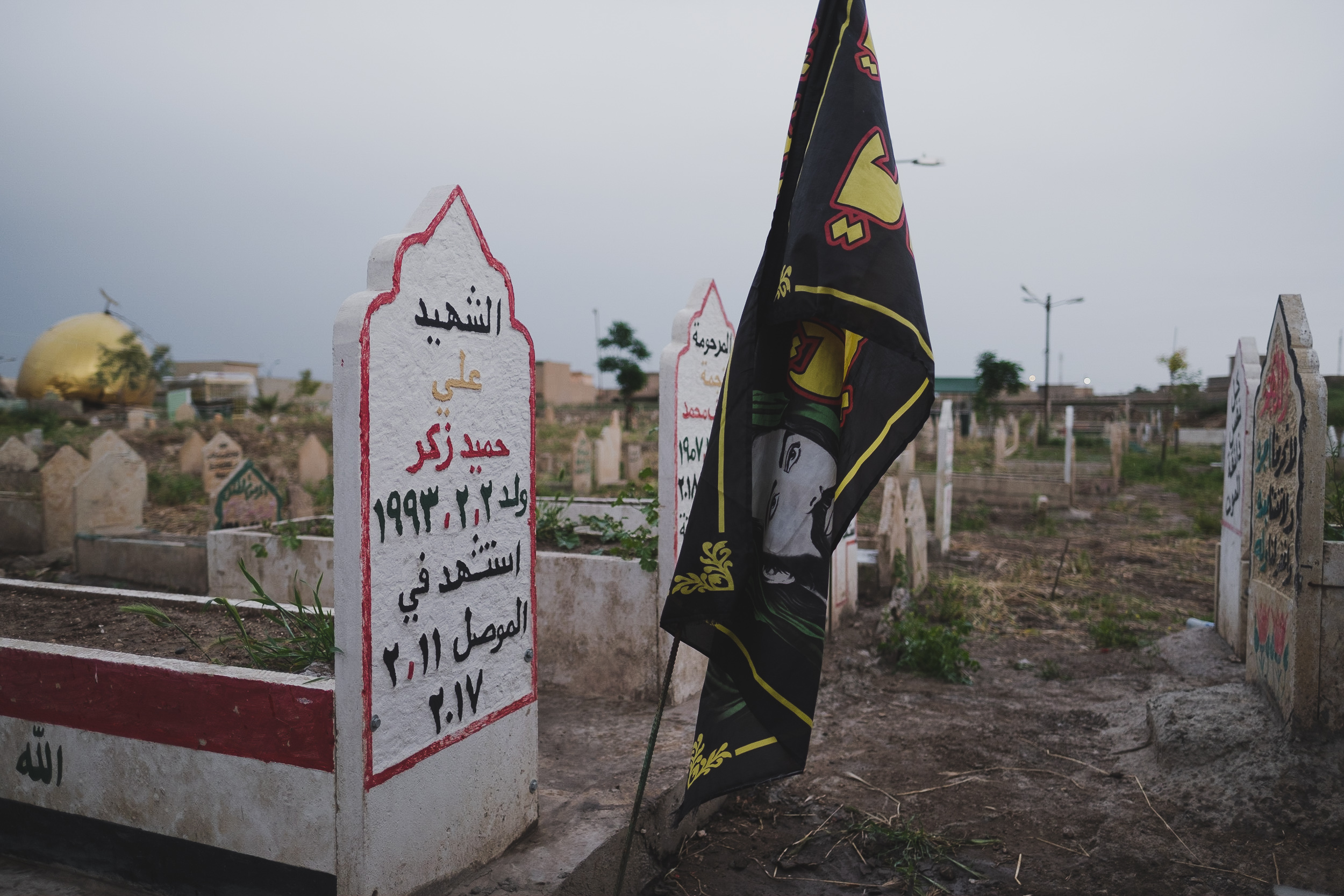 Many Shia martyrs’ graves are at the shrine. (Photo: Kurdistan 24/Levi Clancy)