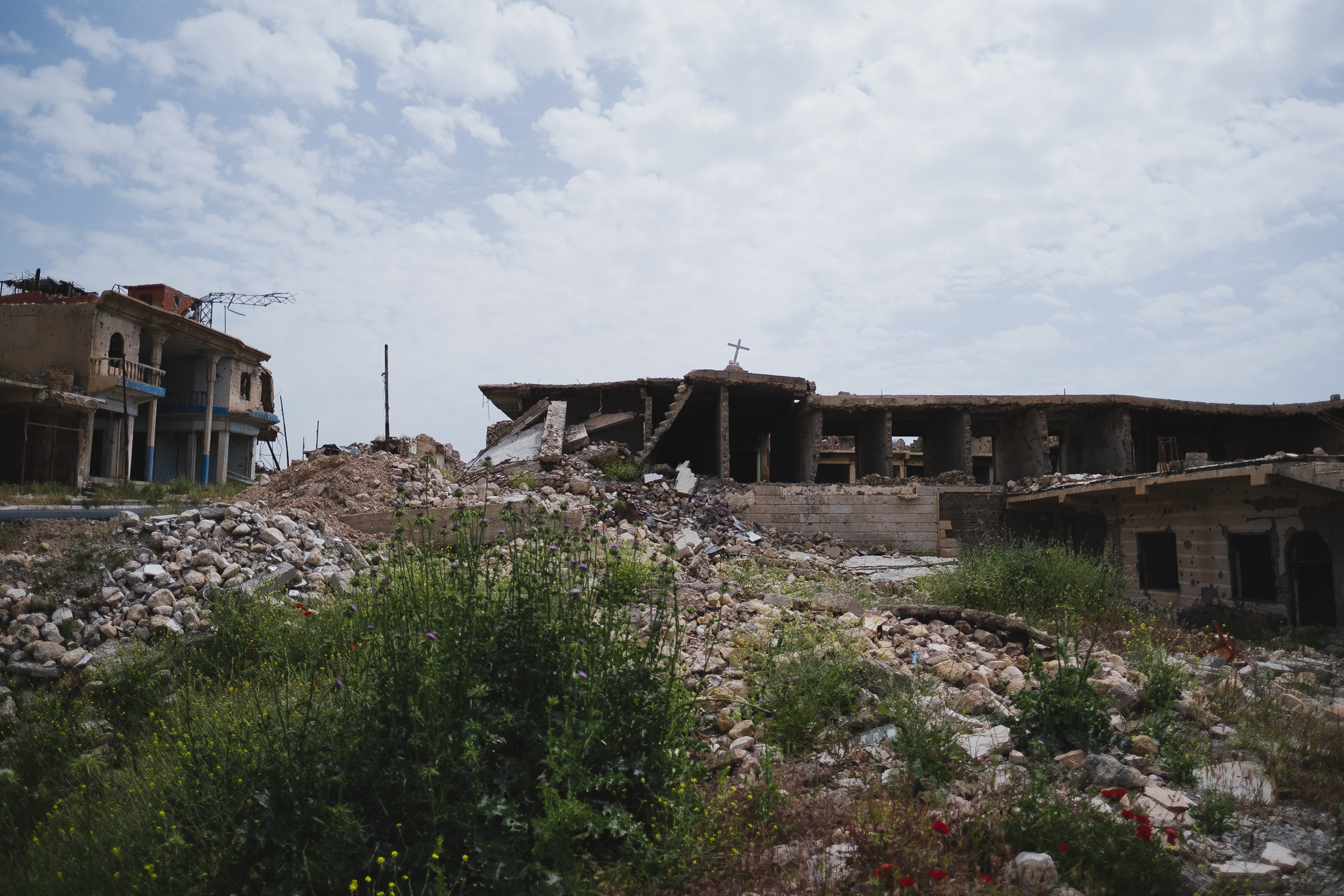 The Syriac Orthodox church of the Virgin Mary, now totally destroyed by bombings. (Photo: Kurdistan 24/Levi Clancy)