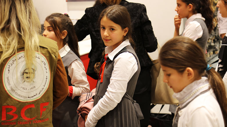 Over 200 children displaced from Kirkuk province are taken to a mall in Erbil by the Barzani Charity Foundation to choose items of new clothing. (Photo: Kurdistan 24/Daniel W. Smith)