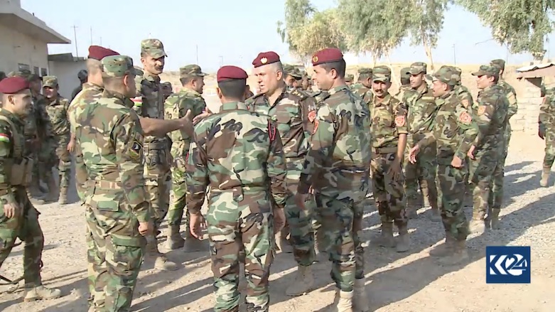 Despite their different faiths, the Kurdish fighters congratuled one another on Eid. (Photo: Kurdistan 24)