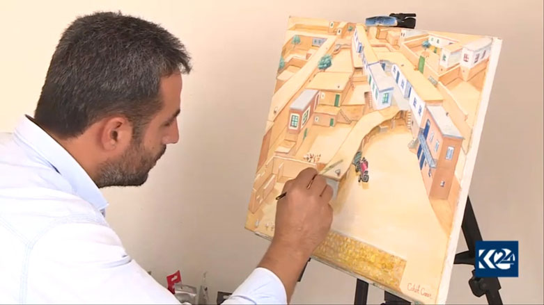 Cahît Caner bêyî perwerdê bibîne wêneyan xêz dike