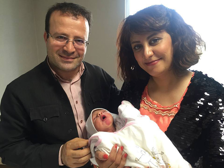 Kameel Ahmady and his wife after the birth of their son Azad, June 16, 2016. (Photo: Social Media)