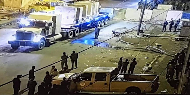 Iraqi security forces deliver concrete barriers to assemble into blast walls in Baghdad. (Photo: Social Media)
