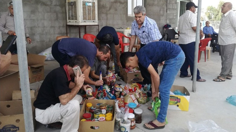 Bi wêne…Ji Gewîlan, Penaber alîkariya penaberan dikin