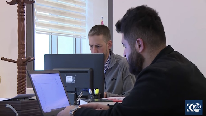 Ferhad Kurdi (right) and Ibrahim Kocher work tirelessly to expand the online Kurdish dictionary. (Photo: Kurdistan 24)
