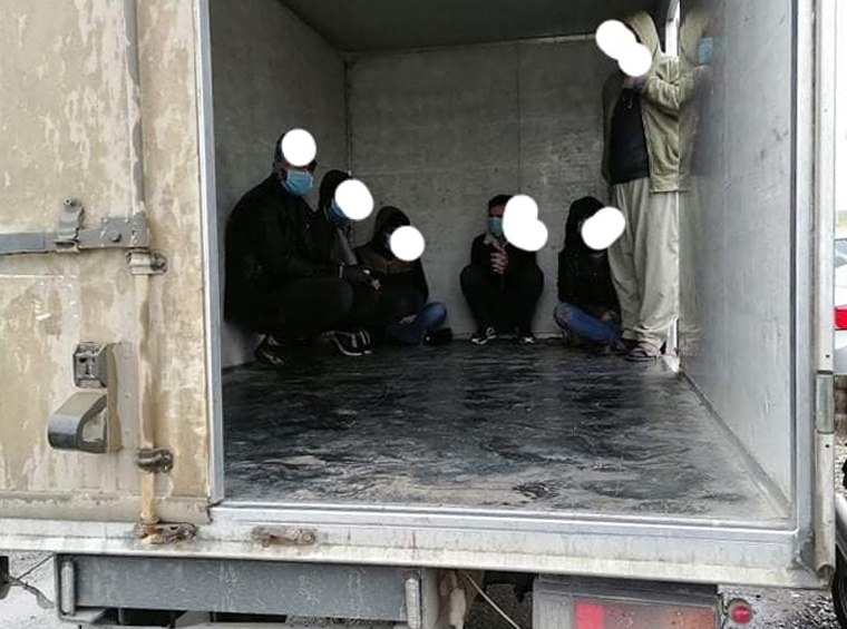 One of the five vehicles whose drivers attempted to smuggle 52 individuals into Erbil in violation of the coronavirus curfew, March 28, 2020. (Photo: Erbil Traffic Police)