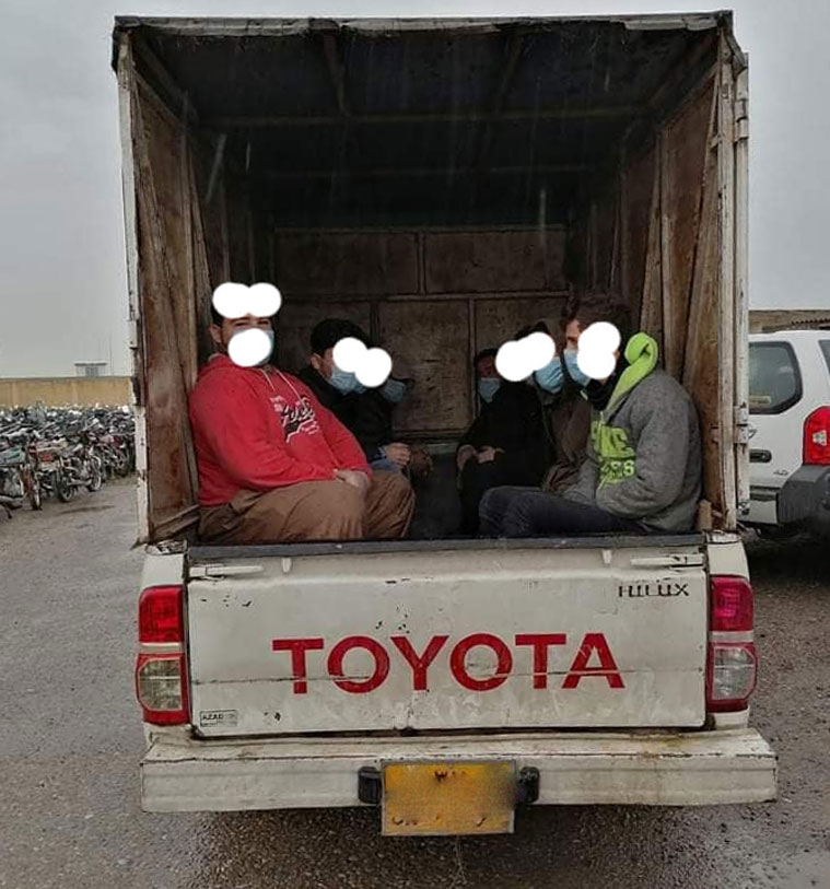 One of the five vehicles whose drivers attempted to smuggle 52 individuals into Erbil in violation of the coronavirus curfew, March 28, 2020. (Photo: Erbil Traffic Police)