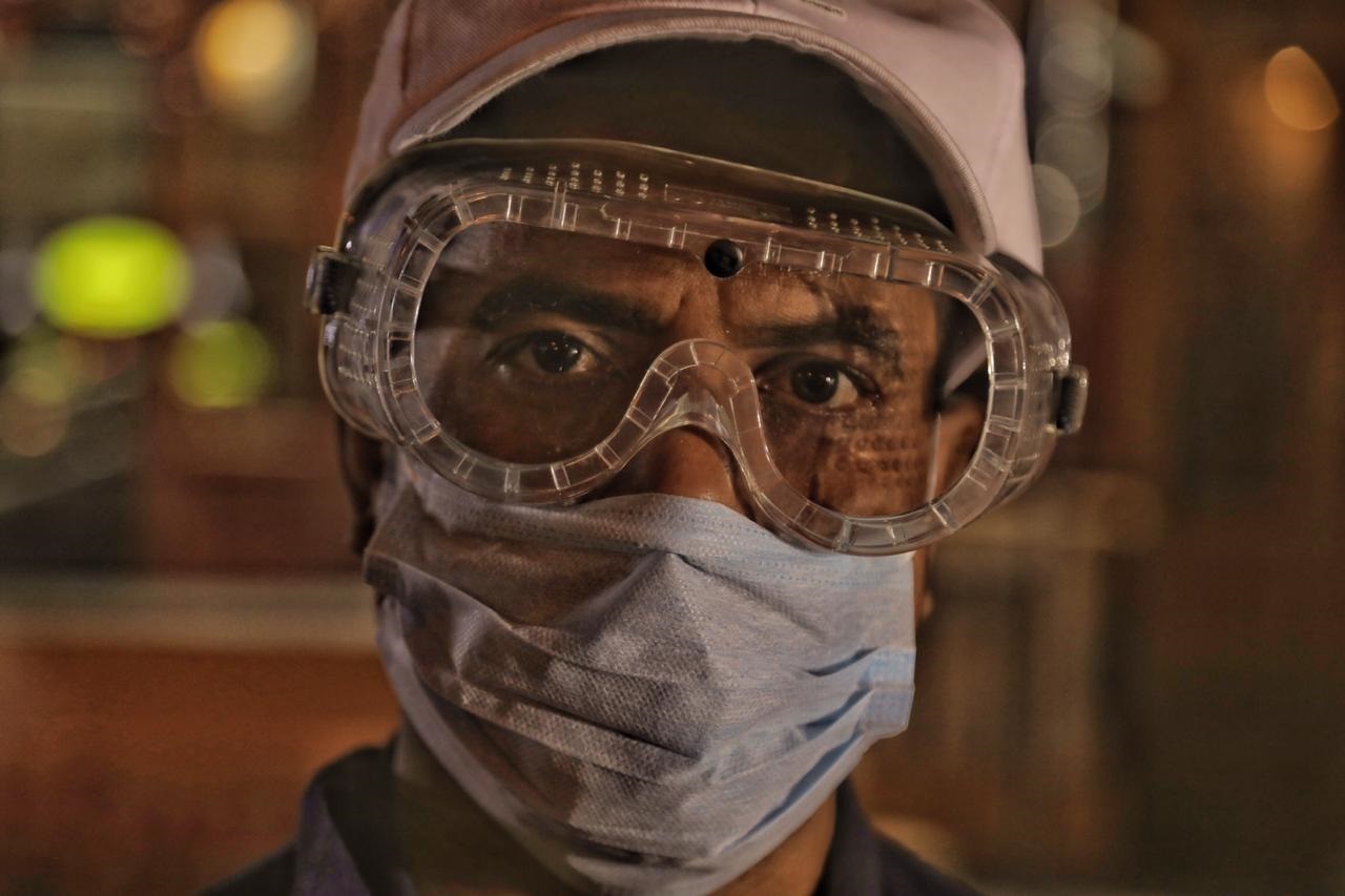 A city worker sprays disinfectant at an Erbil market, March. 7, 2020. (Photo: Kurdistan 24/Iman Farman)