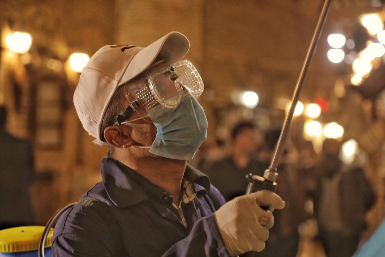 A city worker sprays disinfectant at an Erbil market, March. 7, 2020. (Photo: Kurdistan 24/Iman Farman)