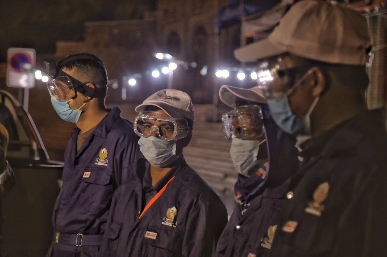 City workers spray disinfectant at an Erbil market, March. 7, 2020. (Photo: Kurdistan 24/Iman Farman)