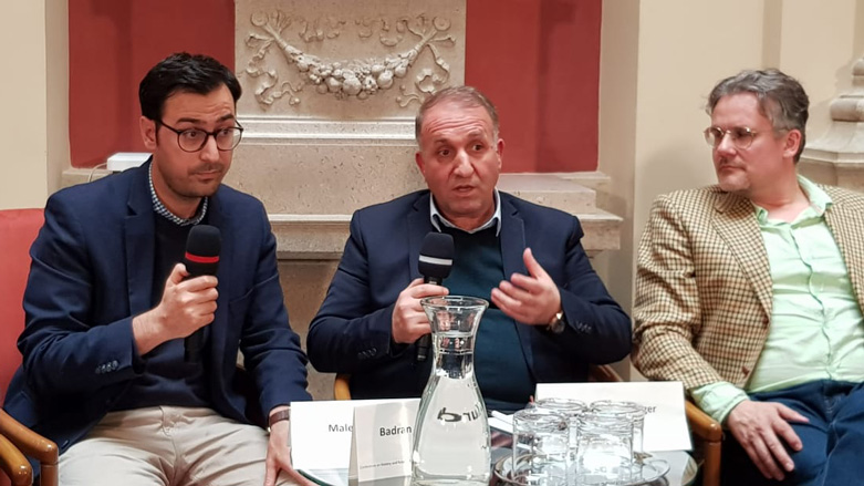 Local Syrian Kurdish official Bedran Çîya Kurd (center) speaks at a conference in Vienna, March 6, 2020. (Photo: Kurdistan 24/Wladimir van Wilgenburg)