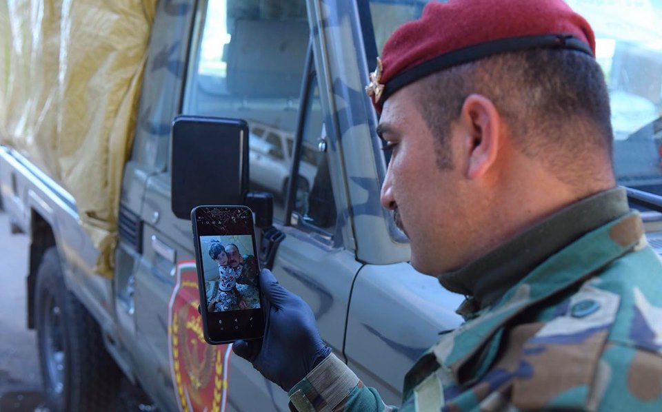 Security forces in Erbil take turns resting while enforcing the regionwide curfew. (Photo: Kurdistan 24)