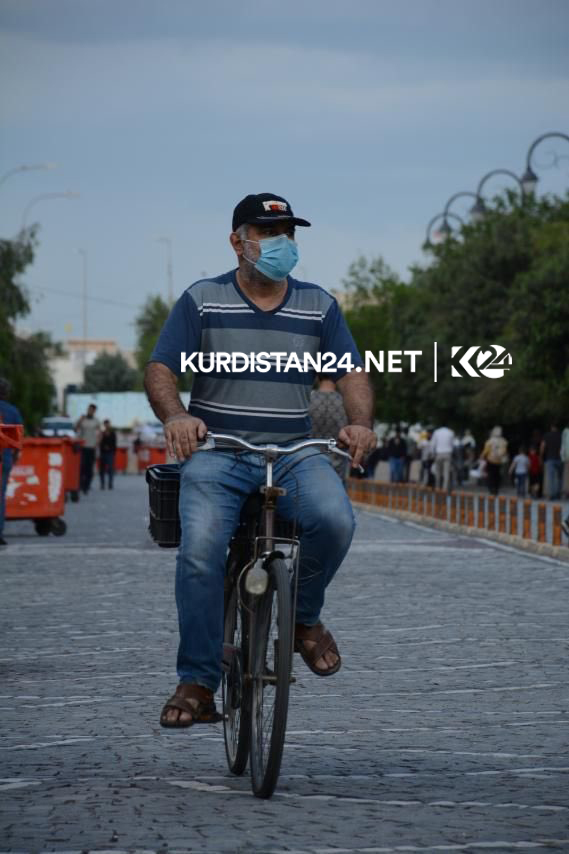 A man bikes near the historic Erbil citadel on April 27, 2020. (Photo: Kurdistan 24)