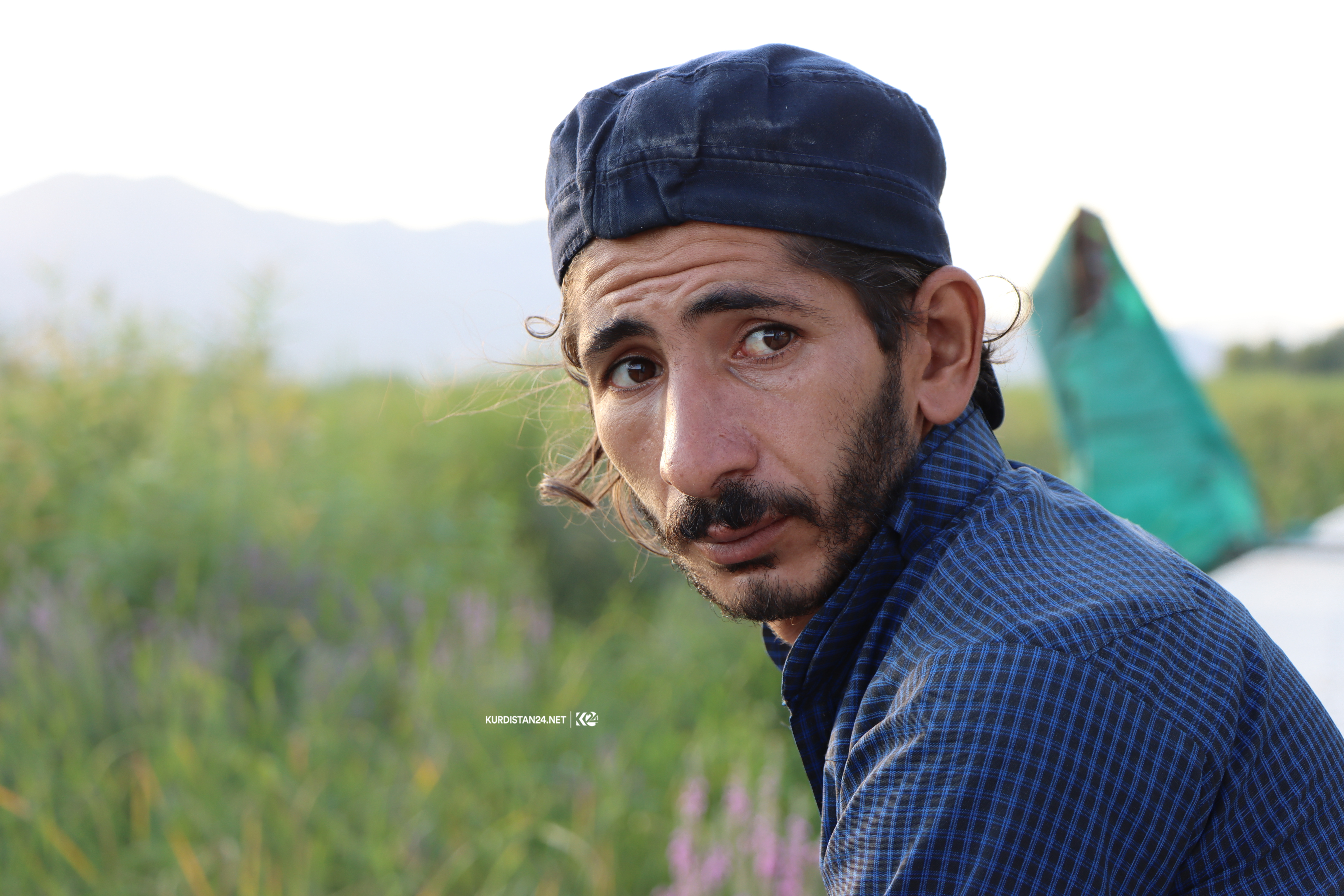 راوكردنی ماسی لە دەریاچەی زرێبار 