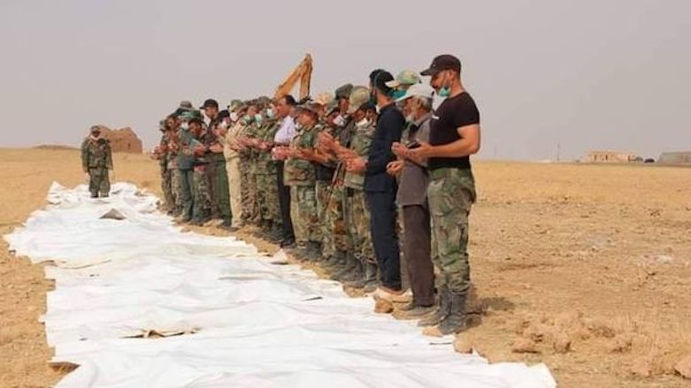 Kurdish-led forces hand over bodies of Syrian soldiers killed by ISIS to Damascus