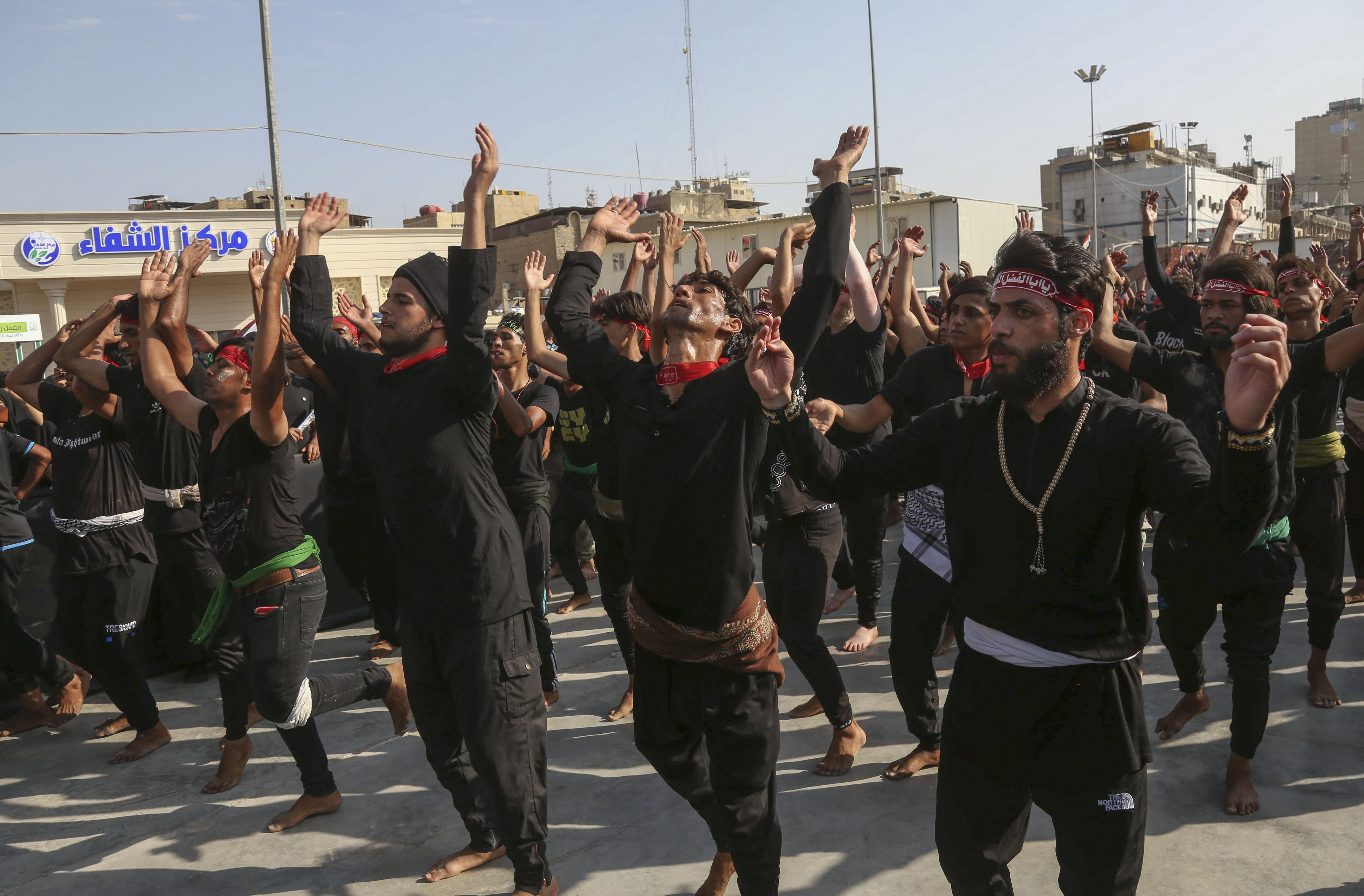 Shia Muslim men take part in a ritual ahead of Arbaeen, which marks the end of the 40-day mourning period for the seventh-century killing of Imam Hussein, Oct. 5, 2020. (Photo: AFP/Mohammed Sawaf)
