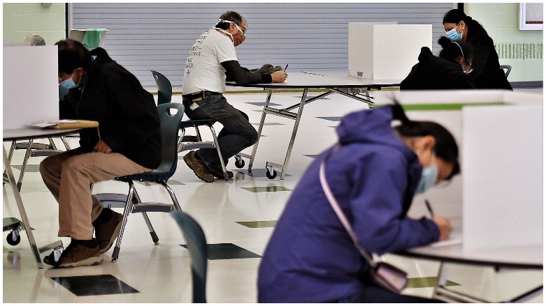 Voters fill out ballots at a polling station on election day in Arlington, Virginia, Nov. 3, 2020. (Photo: AFP/Olivier Douliery)