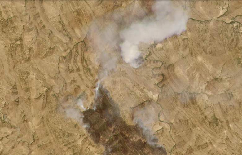 Satellite image by planet labs from August 3, 2020 showing wildfires allegedly caused by Turkish airstrikes on PKK positions north of Sulaimani (Photo: planet labs)