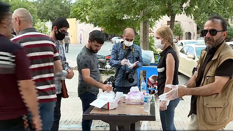 دابەشکردنی دەمامک و دەستەوانە لە سلێمانی