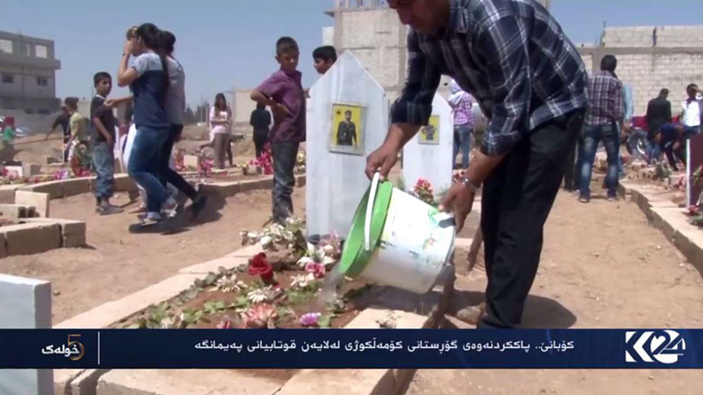 كۆبانێ .. پاككردنەوەى گۆڕستانى كۆمەلكوژى لەلايەن قوتابيانى پەيمانگە